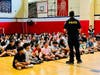 Detective Karousos speaks to the Connolly School 5th graders on June 6, 2025.