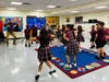 Mr. Crowley's unconventional teaching style gets students up and moving in Performing Arts class