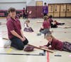 Kindergarteners and their 8th Grade Buddies made giant gingerbread people.  