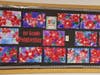 First Graders artwork based on the book, The Legend of the Poinsettia by Tomie dePaola
