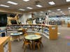 The kids' library is open and colorful, something you might find at kindergarten