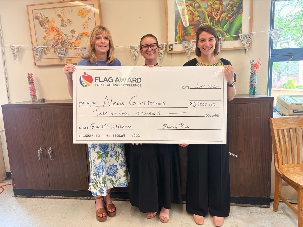 Alexa Gutterman (middle), a teacher at Benjamin N. Cardozo in Bayside, holds her giant $25K check alongside Laura Twersky (left) and Risa Daniels (right).