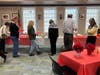 Members of the Friends of the Simsbury Public Library preparing the celebration lunch