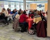 Library staff and Friends of the Simsbury Public Library enjoy lunch together  