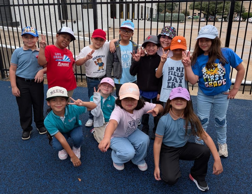 Students pose with their Cap for Kids Headwear