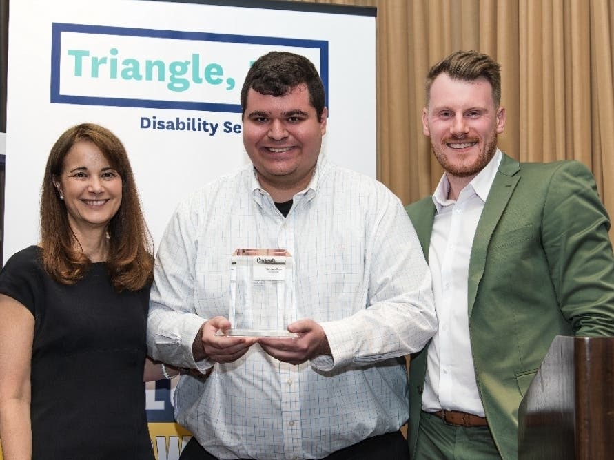 Triangle, Inc. CEO Rachel Kaprielian, Matthew Rego of Medford, and Travis Dion, Director of Autism Services at Triangle, Inc. at the nonprofit’s annual awards ceremony and fundraiser. 