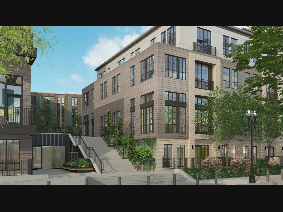 The development consists of three mixed-use buildings offering studio, one-, two- and three-bedroom floor plans.