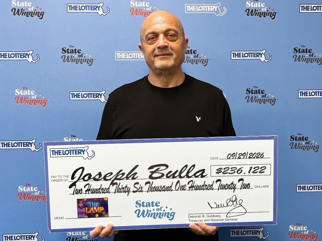 Bulla claimed the prize at the Lottery's headquarters in Dorchester.