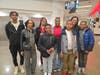 HOOP LOVERS: Family and friends support the 2025-26 Washington Wizards; from left are: Nathan Lightfoot, Nickei Bent, A.J. Barnes, Devyn Barnes, Jen Harris, John Harris, Rita Turner and Jaylen Barnes.

