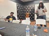 Neal McDowell (left), described his youthful experiences in Beaver Falls in the 1980s and '90s. The business owner said his early BF experiences propelled him onto adult success. Videographer Gee Mobley looks on while working media sessions