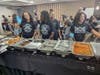 Food Crew - family members are in charge of distributing food at the annual cook-in.