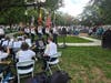 Color Guards of the Westminster Municipal Band display national colors, as the band prepares to play the Star Spangled Banner as several community onlookers enjoy the annual affair. Weather gods showed mercy with a non-humid, late afternoon, sunny day.