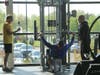 Visitors use strength training equipment at the YMCA Fairless Hills branch