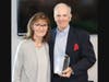 (L-R) Carolyn Purdy stands with her husband Robert G. Purdy with his 2023 Lois Burpee Award at the Doylestown branch of River Crossing YMCA on June 19. 