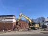 Heavy equipment at the former Chic Miller Chevrolet building in Bristol on April 9, 2026. The owner is demolishing the building to make way for future development.