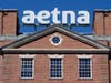 The corporate sign atop Aetna headquarters is seen Aug. 19, 2014, in Hartford, Conn.