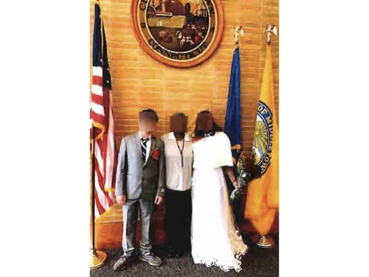 A sham marriage conducted on or about July 24, 2023 in Middletown, Connecticut.