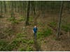 Charles Copley walks along a trail on his property in Roxbury, Connecticut.
