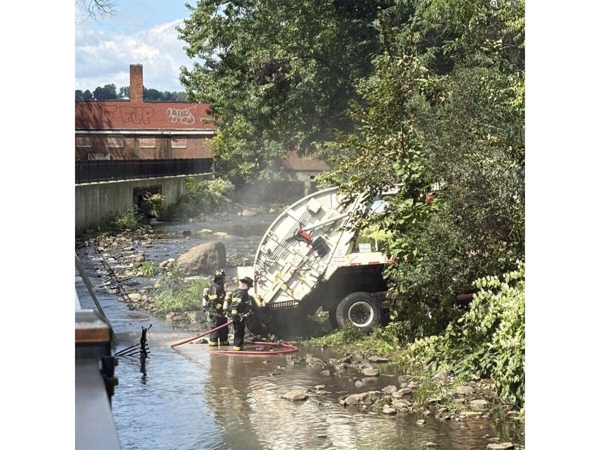A commercial garbage truck went off the road and into a Bristol river in an accident on Sept. 4, 2026.