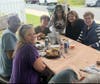 Director of Sales Terri Doody and her family pause for a smile while enjoying the Crab Feast at The Vero at Newark.