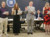 Four members of the Community High School District 218 Board of Education were sworn in on Tuesday, including one new member.