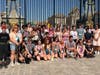 Band students from nine Chicagoland high schools stand outside the Palace of Versailles in France.