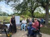 Alicia Hill spends time connecting with residents of Juniper Village at Mount Joy. 