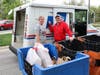 Orland Township Volunteers work alongside United States Postal Services workers to collect food during Stamp Out Hunger.