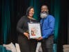 (Left to Right) Shermika Settles, Horton’s Kids parent and graduate, receives the Julie Lonardo Community Champion Award from Rahaman “Kil” Kilpatrick, Community & Family Engagement Senior Manager for Horton's Kids.