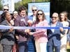 Celebrating during the Wellness Within Reach ribbon-cutting were Harvest House team members (front row, from l-r) Dr. Karen Kennedy, Dan Minor, Erin Minor and John Lopez