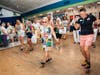Guests at Silver Pride 2026 participated in line dancing; Senior Friendship Centers President & CEO Erin McLeod (in sunglasses) is front and center