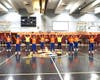 FOWPAL performed dynamic music and dance numbers, sharing uplifting messages with students and families during a basketball game.