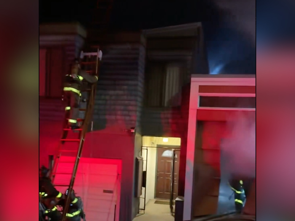 Fire crews work on extinguishing a blaze in San Francisco on Wednesday, March 25. 