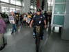 Protesters march through SFO on Friday, May 1. 
