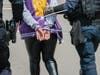 Police make an arrest during a protest at SFO on Friday, May 1. 