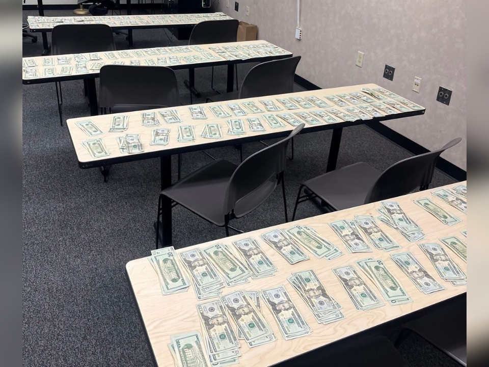 A pile of recovered cash that was stolen from a technician working on an ATM in Alameda on Thursday, June 25.