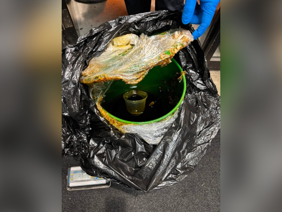 A bucket containing an unknown suspect that officers seized during a drug arrest in Alameda on Sunday, according to police. 