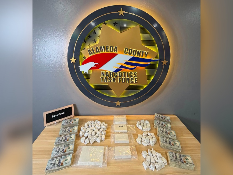 Drugs and cash that were seized during a raid in Oakland last week.