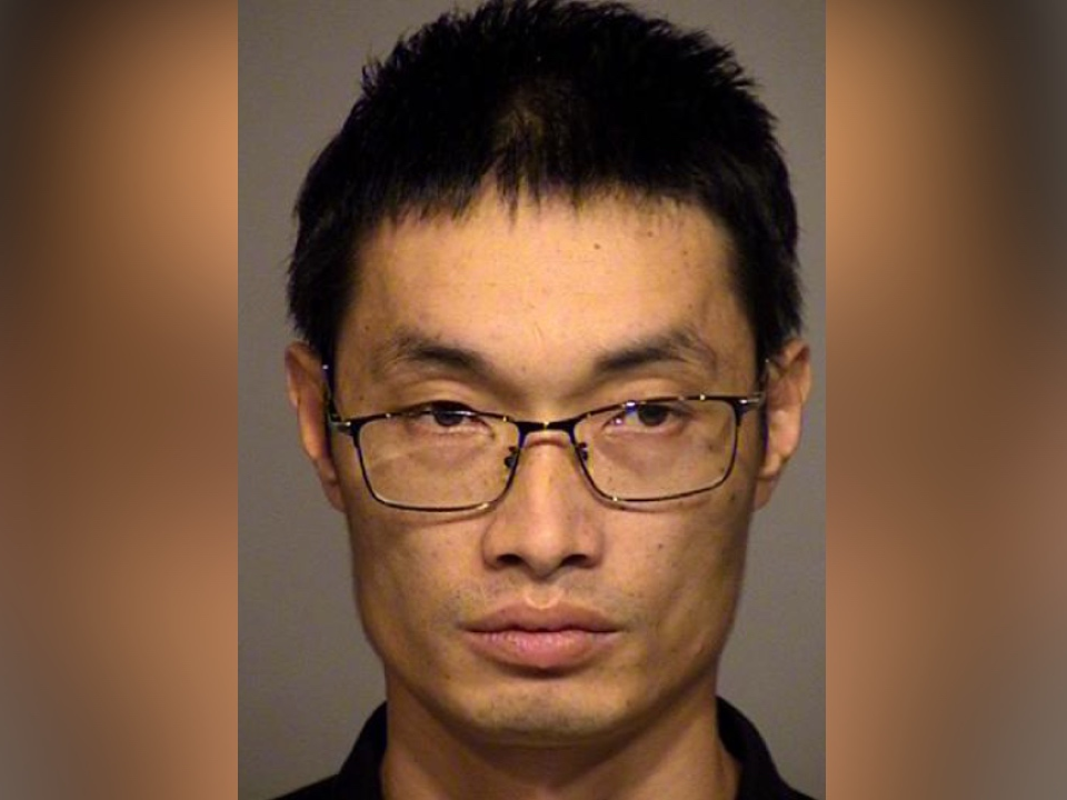 A photo of the suspect, Ze Li. 