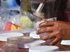 A vendor serves a customer flavored water during the annual King of the Streets event on Saturday, Sept. 19. 