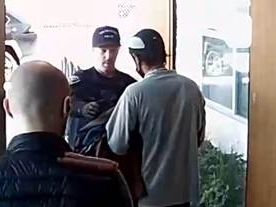 Police conduct an investigation into thefts at an REI store in San Francisco. 