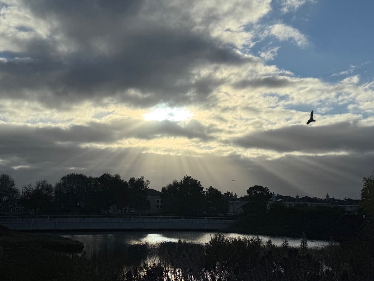 Morning rays shining through clouds at Redwood Shores on Tuesday, Oct. 27.
