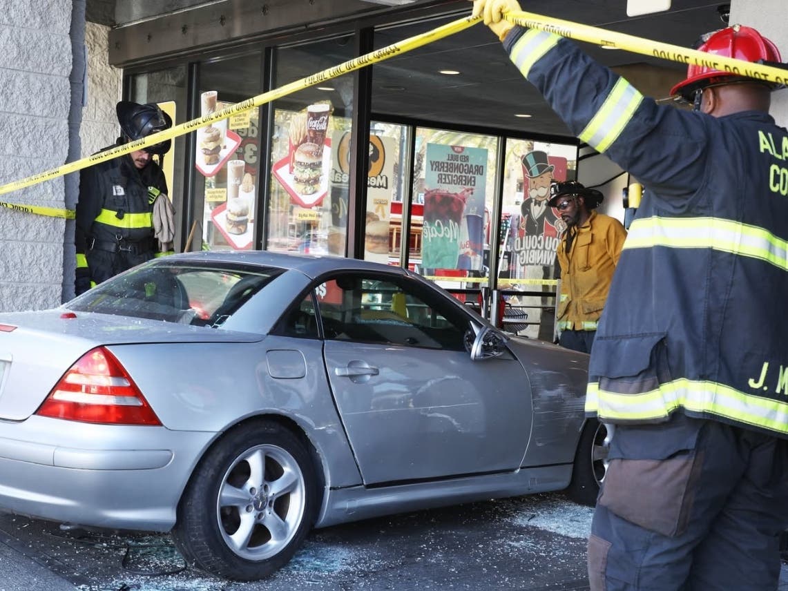 Police say the car came to a rest inside the dining area.