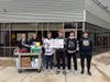 Members of the Lincoln-Way Lancers Hockey Club's JV2 team dropped off donated goods and birthday kits to the Frankfort Township Pantry.