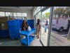 Team members Precindy Colas, Mia Leonard and (holding the door) Michael Guerrisi at the new Blue Heron ADC