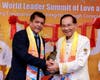 Health Minister Lackram Bodoe and Dr. Hong warmly interact during the bell-ringing ceremony.