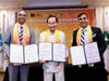 Dr. Hong, center, Senator Darrell Allahar, left, and Senator Taurel Shrikissoon jointly endorsed the Declaration of Transparency and Integrity.