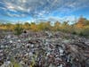 The demolished buildings never left... Building Rubble litters the campus 22 years later.