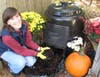 Harvesting compost from an Earth Machine. 