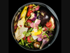 Food scraps in an Eco 3 FoodCycler bucket. 